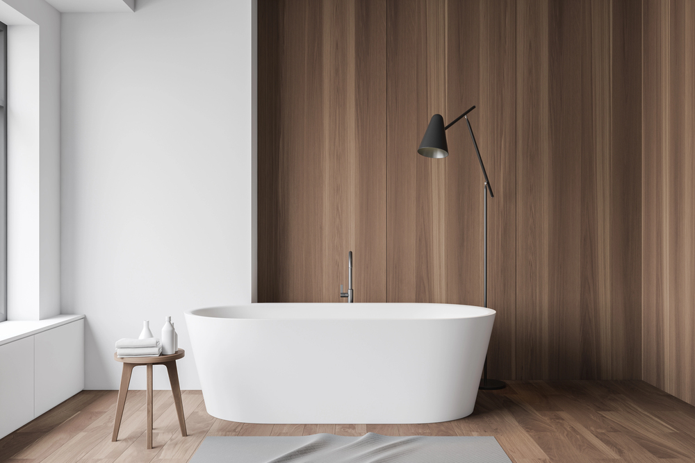 Always align the material with the humidity and traffic of the room. Real wood in bathrooms leads to warping, cupping and costly water damage.
